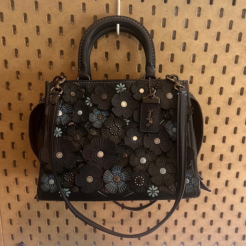 Coach Rogue 25 Handbag with Tea Rose Appliqué. Navy blue.